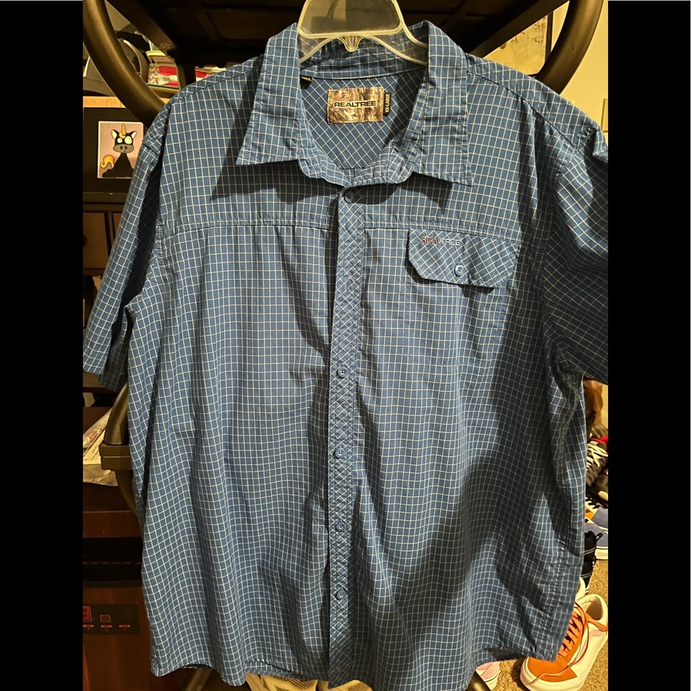 Realtree button up, blue white white stripes. Xxl size an like new
